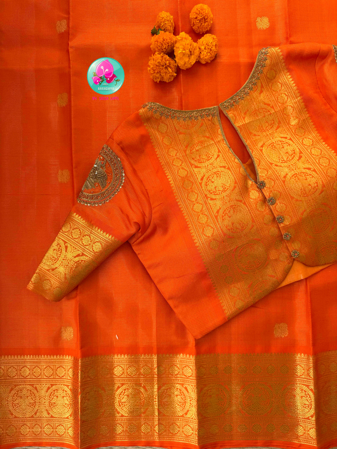 Radiant Solar Crest: Orange Vaira Oosi Kanchipattu Saree with Hand-Embroidered Gandaberunda Art