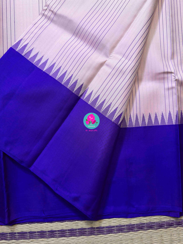 Sannajaji Serenity: Baby Pink Kanjivaram saree with Bold Royal Blue colour
