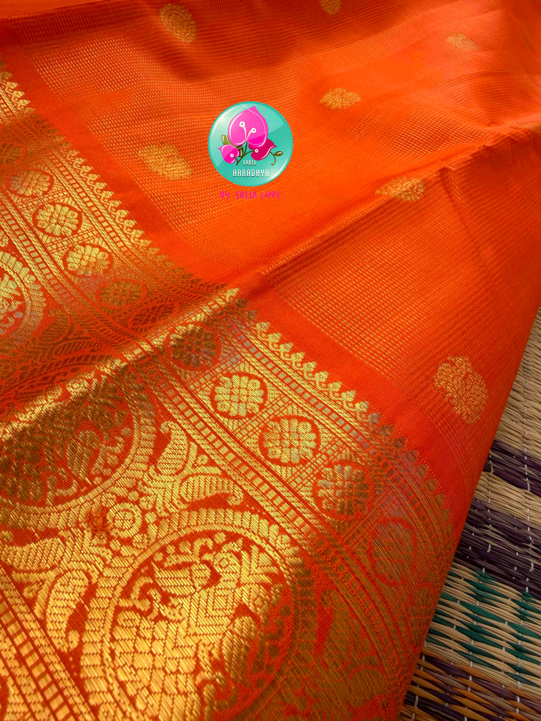 Radiant Solar Crest: Orange Vaira Oosi Kanchipattu Saree with Hand-Embroidered Gandaberunda Art