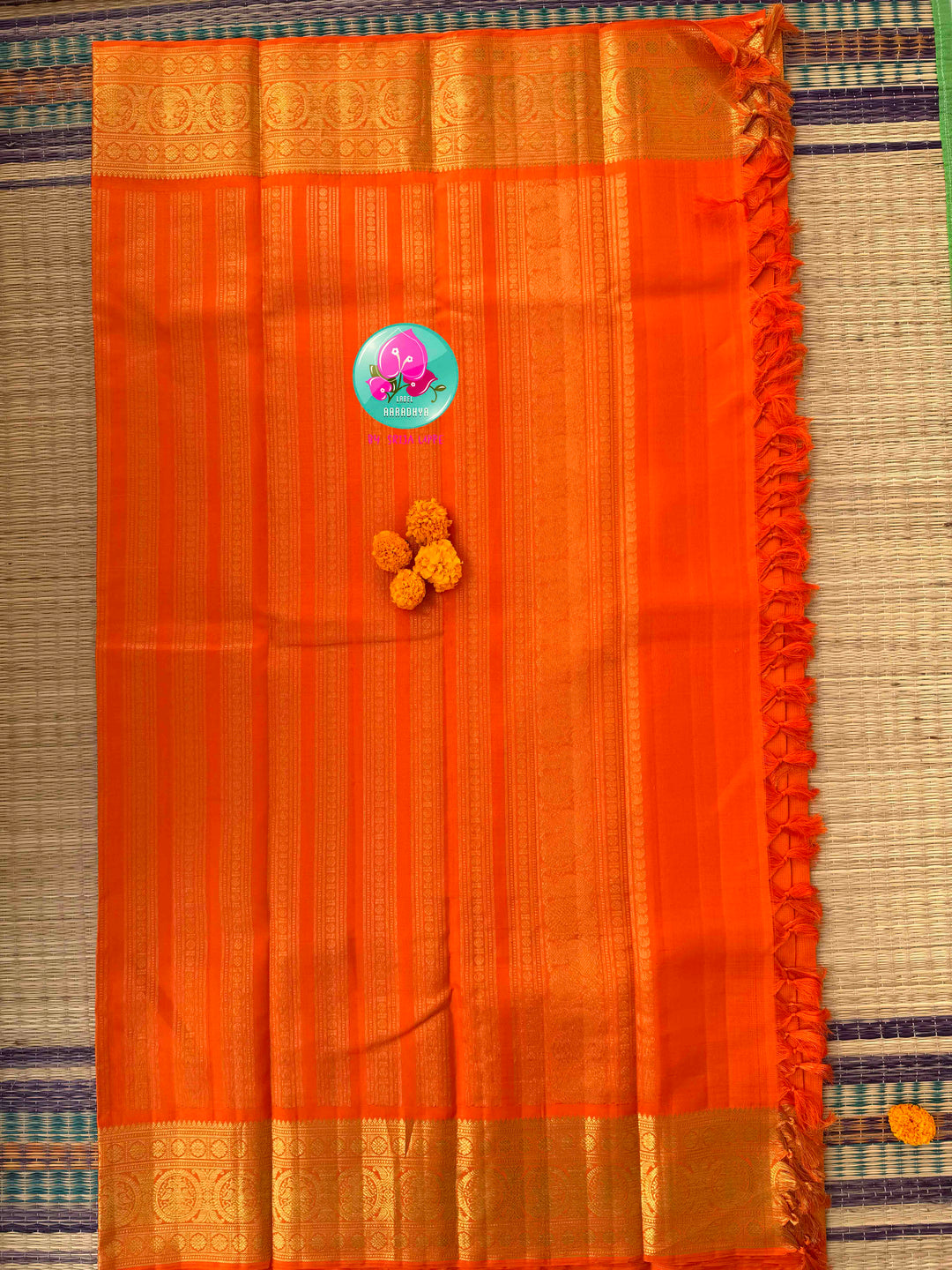 Radiant Solar Crest: Orange Vaira Oosi Kanchipattu Saree with Hand-Embroidered Gandaberunda Art