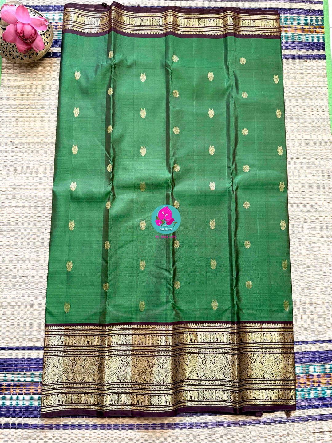 Traditional big border Kanchipattu handloom saree in Green and brown
