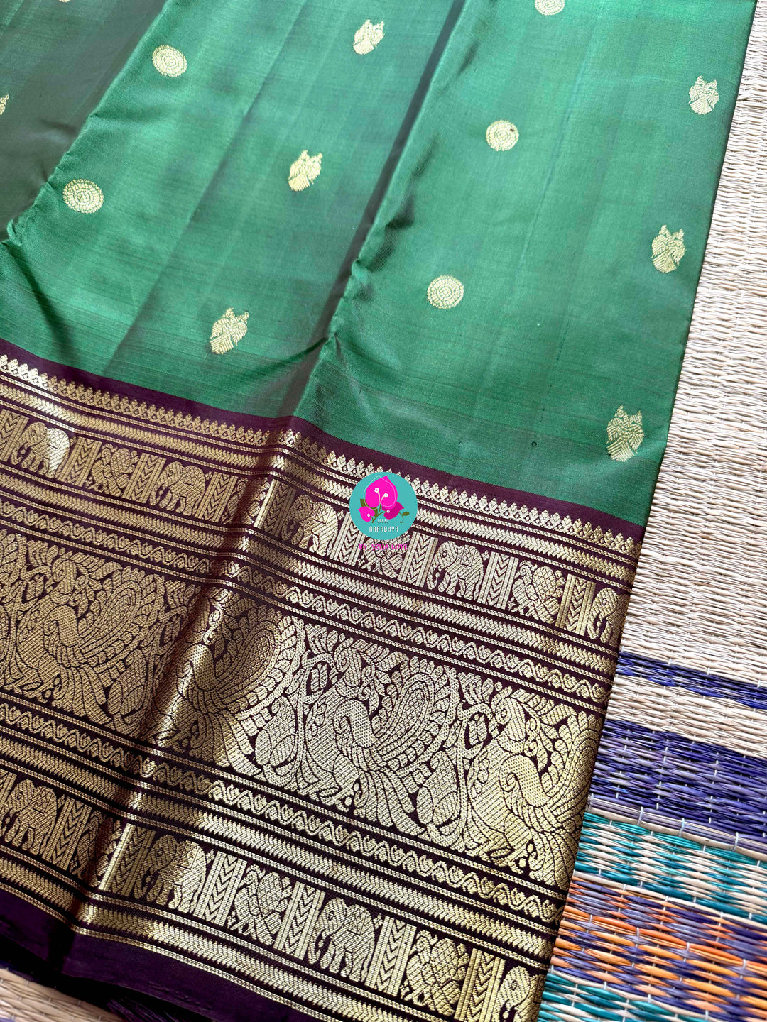 Traditional big border Kanchipattu handloom saree in Green and brown