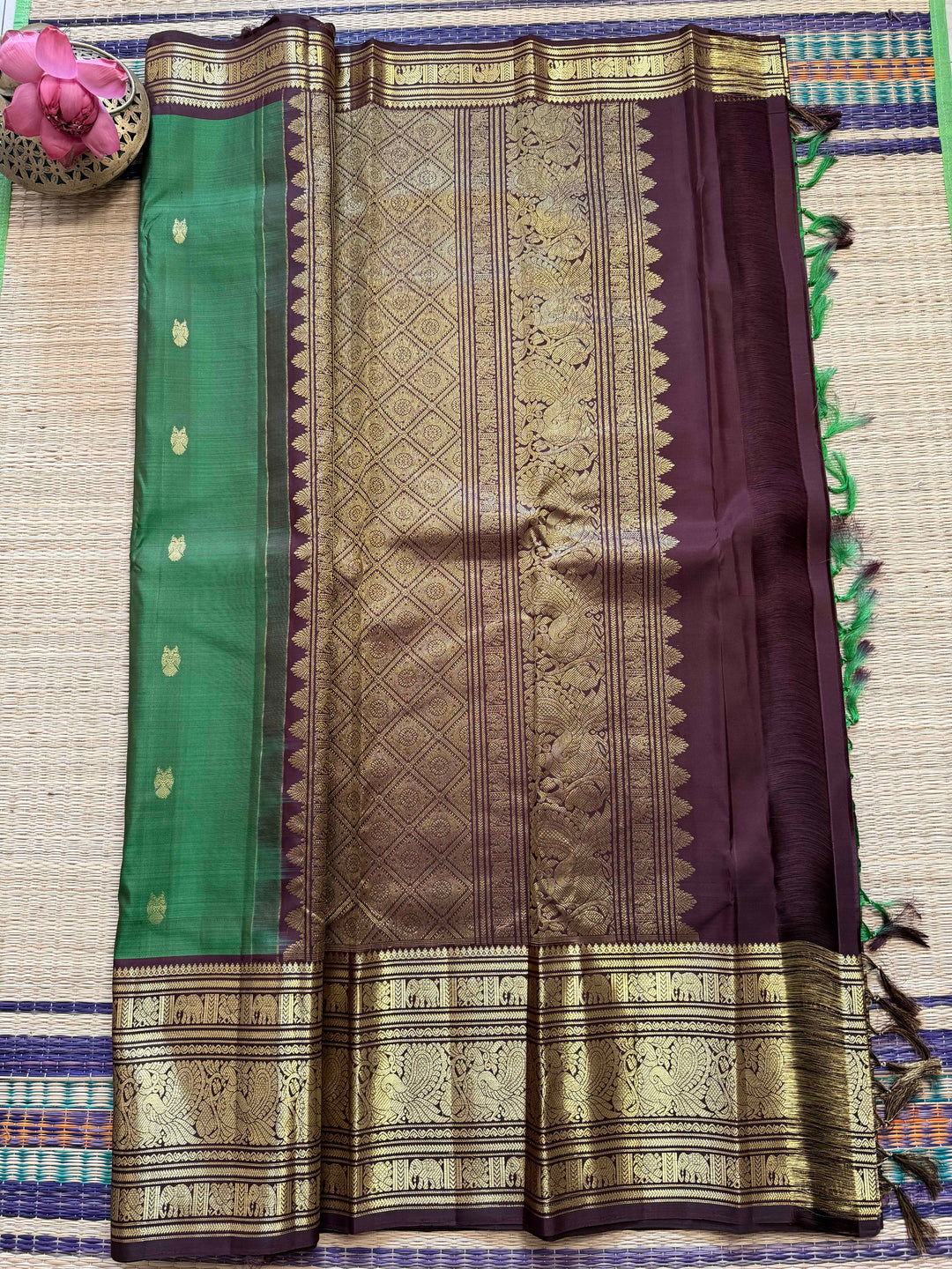 Traditional big border Kanchipattu handloom saree in Green and brown