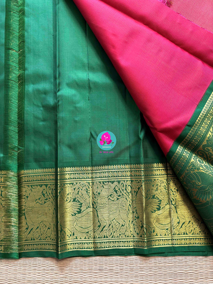 Vaira oosi Kanchipuram handloom saree in vintage Pink and Green