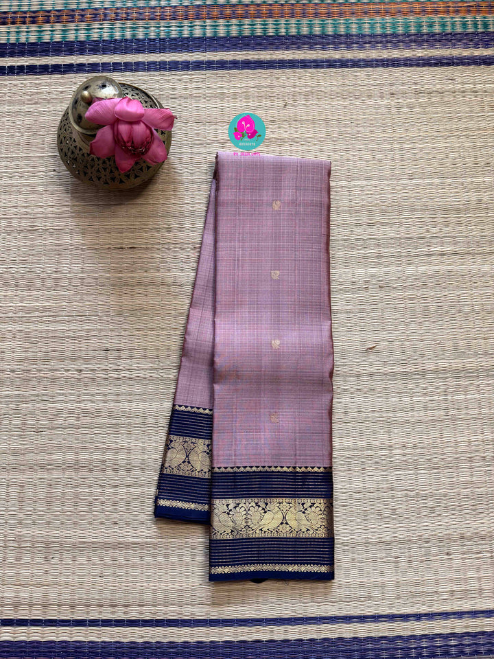 The Handloom Whisper: Pure Silk Saree in Soft Pink and Bold Blue Zari Border
