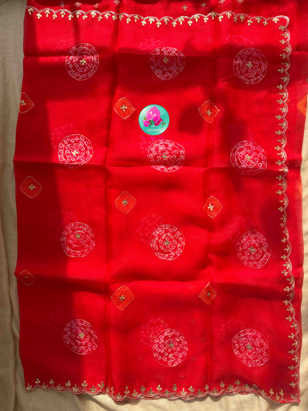 Auspicious Crimson Splendor: Bright Red Bandhani Kota Silk & Emerald Tissue Mirror Blouse