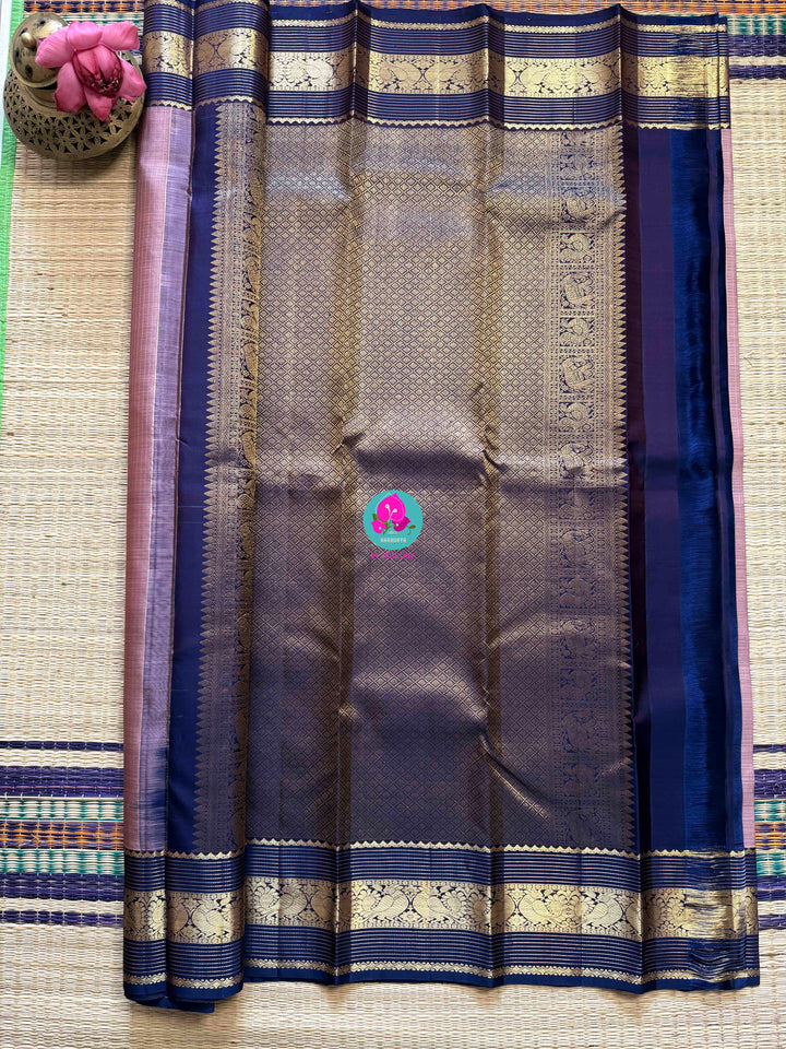 The Handloom Whisper: Pure Silk Saree in Soft Pink and Bold Blue Zari Border