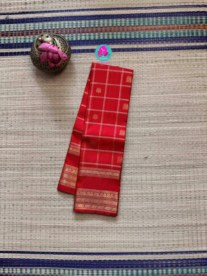 SareeThe Crimson Treasure: Timeless Red Silk Saree with Elegant Zari Weave