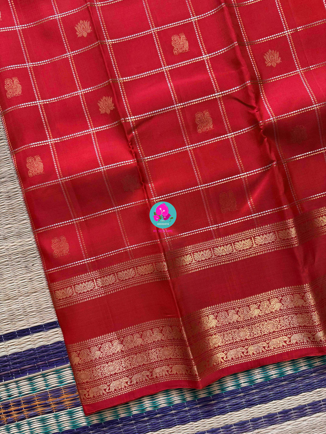 SareeThe Crimson Treasure: Timeless Red Silk Saree with Elegant Zari Weave