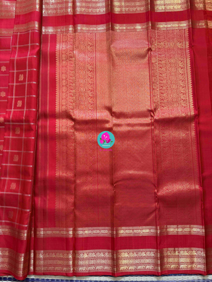 SareeThe Crimson Treasure: Timeless Red Silk Saree with Elegant Zari Weave