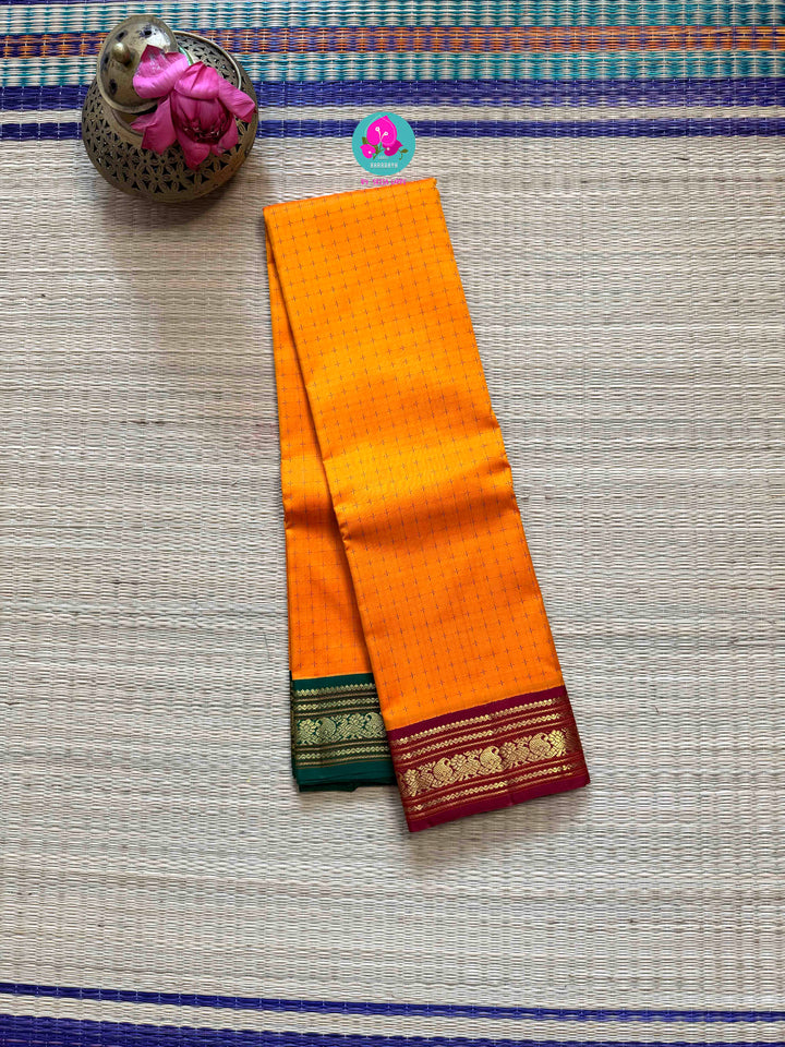 The Confluence of Silk: Mustard Orange Kanjivaram with Ganga-Jamuna Border Saree