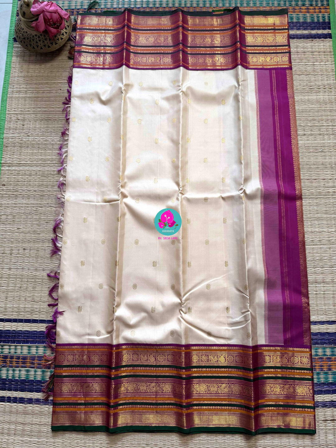 Jewel Tones: Offwhite Kanjivaram Saree with mix of Bright magenta, green & mustard Contrast border