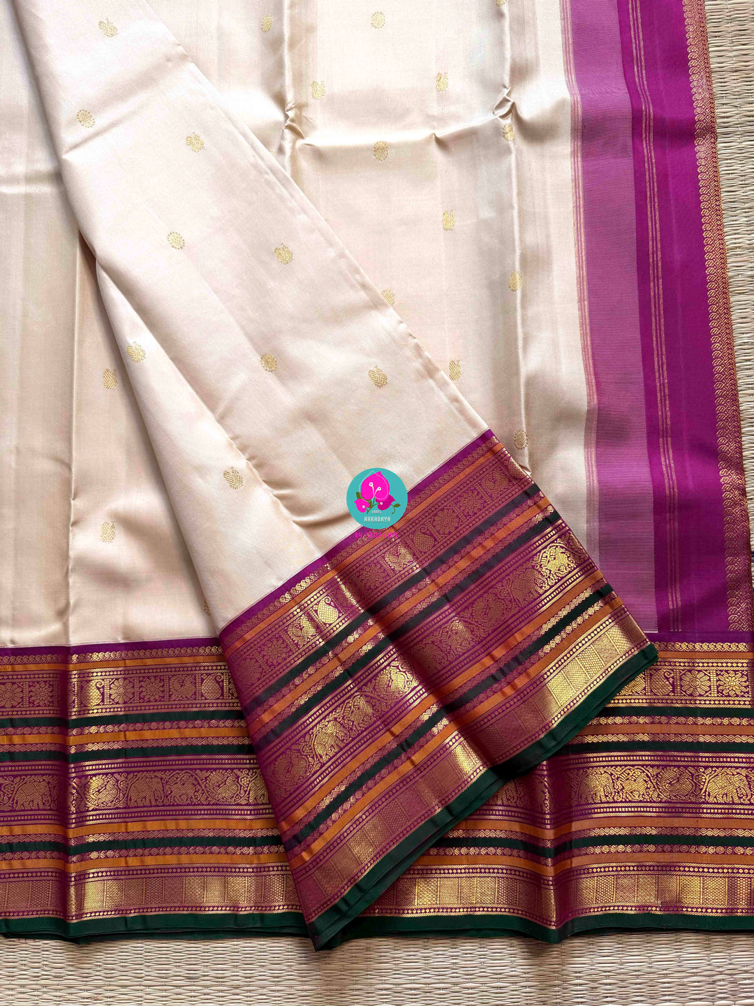Jewel Tones: Offwhite Kanjivaram Saree with mix of Bright magenta, green & mustard Contrast border