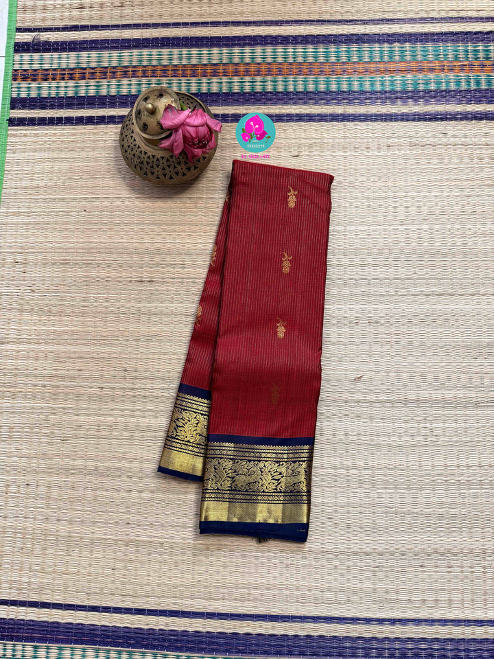 Nostalgia Woven in Silk: Vintage Red Kanjivaram with Navy Blue Contrast