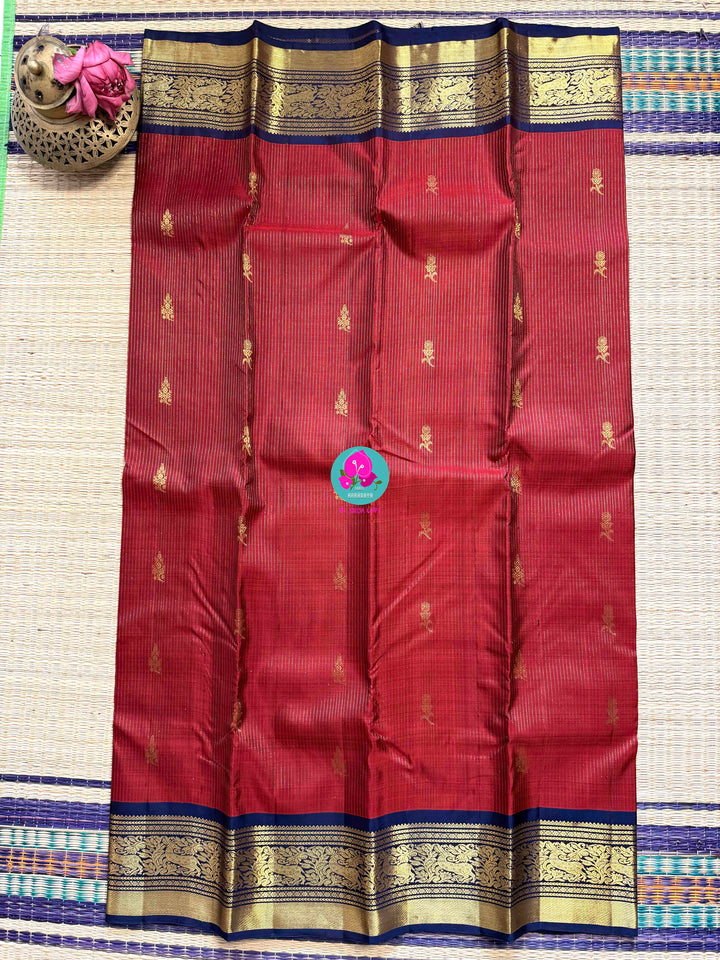 Nostalgia Woven in Silk: Vintage Red Kanjivaram with Navy Blue Contrast