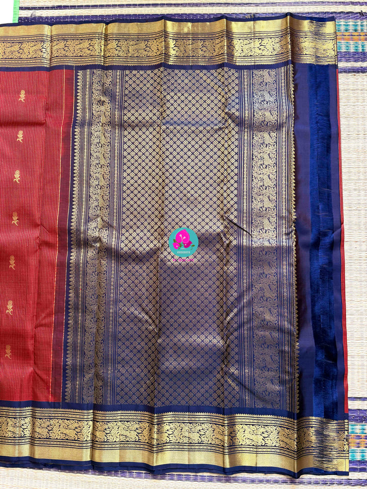 Nostalgia Woven in Silk: Vintage Red Kanjivaram with Navy Blue Contrast