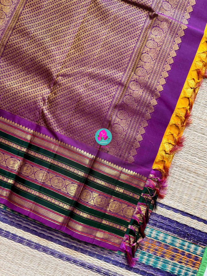The 3G Zari Grandeur: Vintage Yellow Saree with Forest Green & Purple Edge