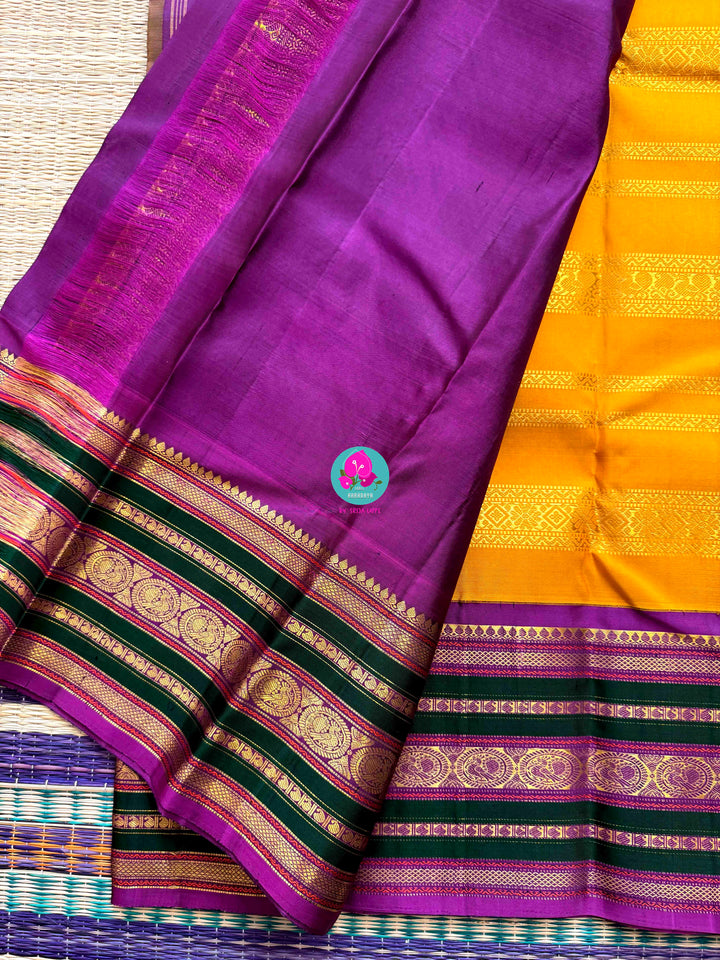 The 3G Zari Grandeur: Vintage Yellow Saree with Forest Green & Purple Edge