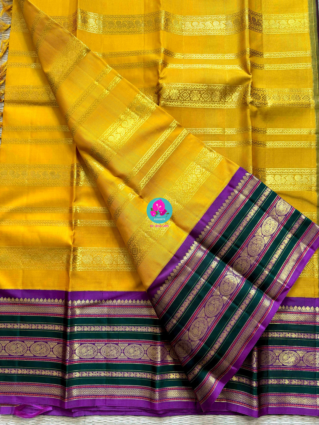 The 3G Zari Grandeur: Vintage Yellow Saree with Forest Green & Purple Edge