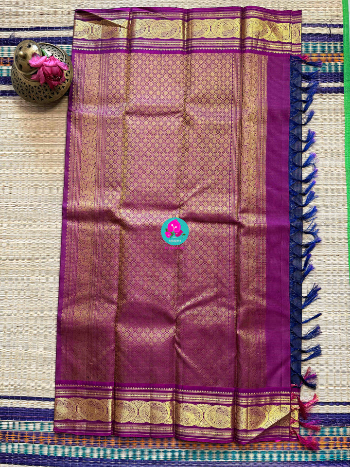 Midnight & Magnolia: Vaira Oosi Checks in Navy Blue with Rani Pink Contrast Kanchipattu silk Saree