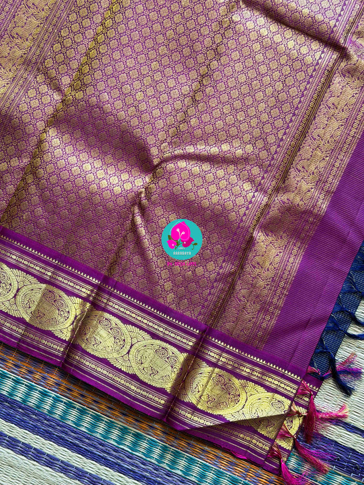 Midnight & Magnolia: Vaira Oosi Checks in Navy Blue with Rani Pink Contrast Kanchipattu silk Saree