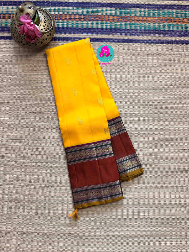 Golden Earth: Vintage Yellow Kanjivaram with Rich Brown Gap Border