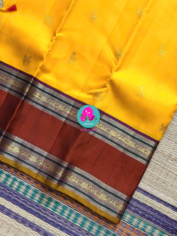 Golden Earth: Vintage Yellow Kanjivaram with Rich Brown Gap Border