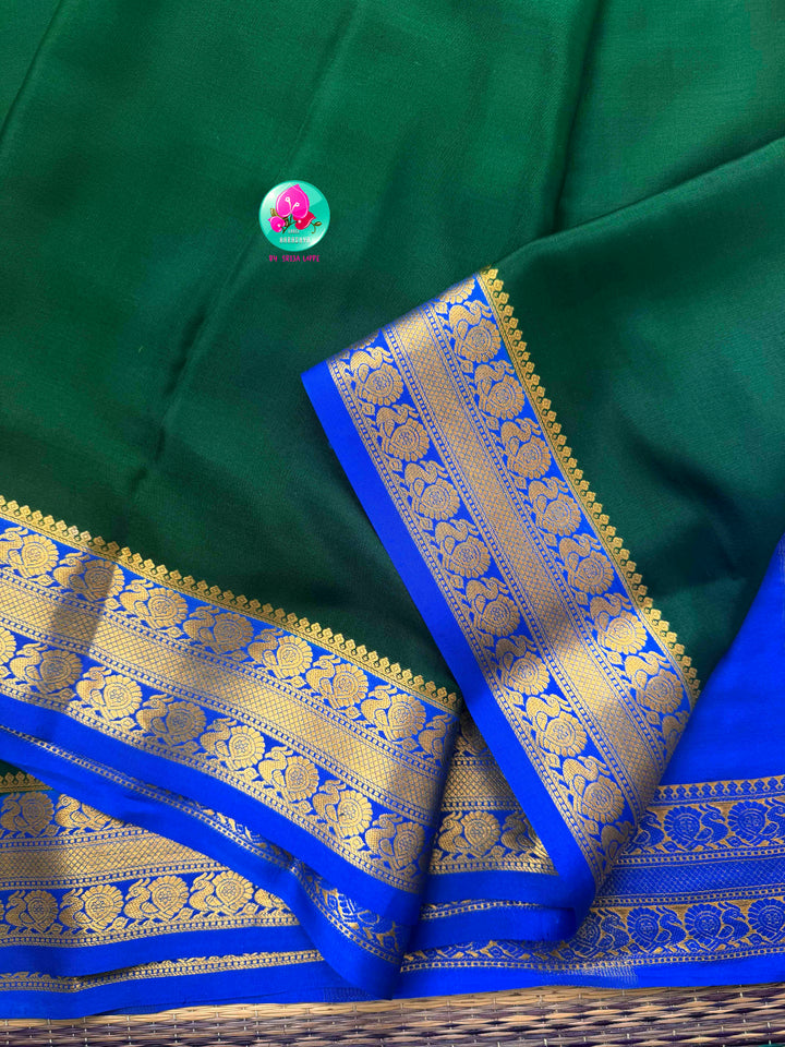 Regal Peacock Harmony: Deep Bottle Green & Royal Blue Pure Mysore Silk Fusion Saree