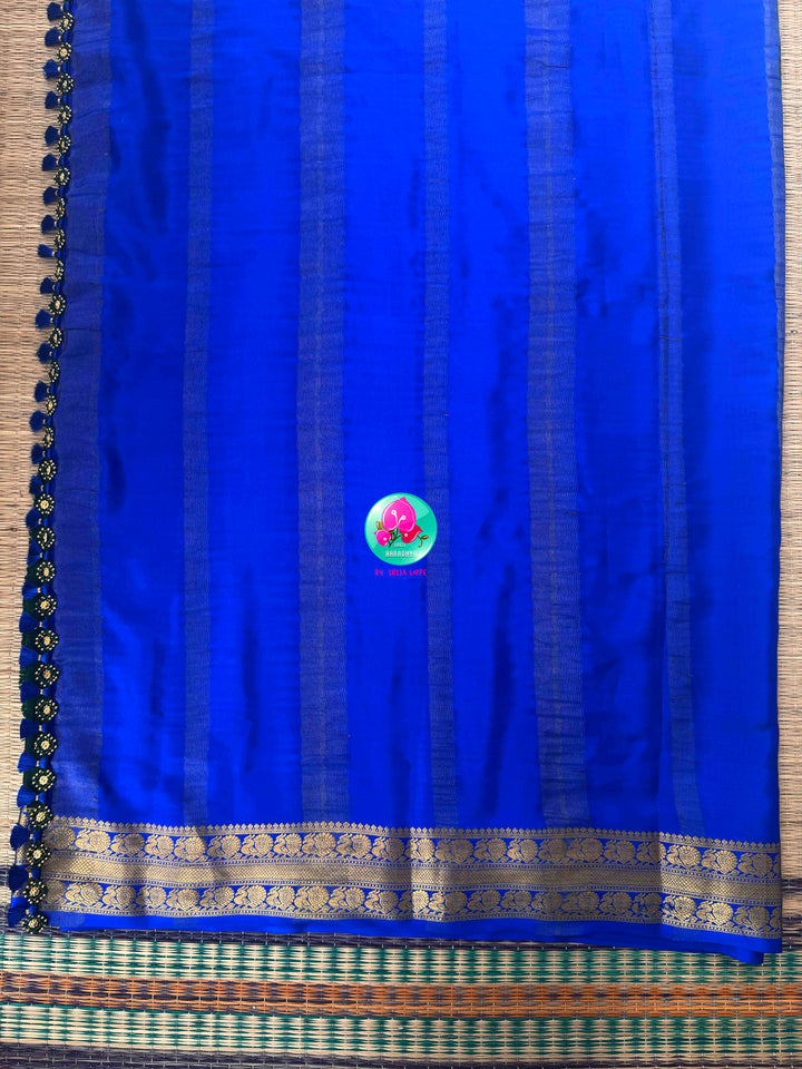 Regal Peacock Harmony: Deep Bottle Green & Royal Blue Pure Mysore Silk Fusion Saree