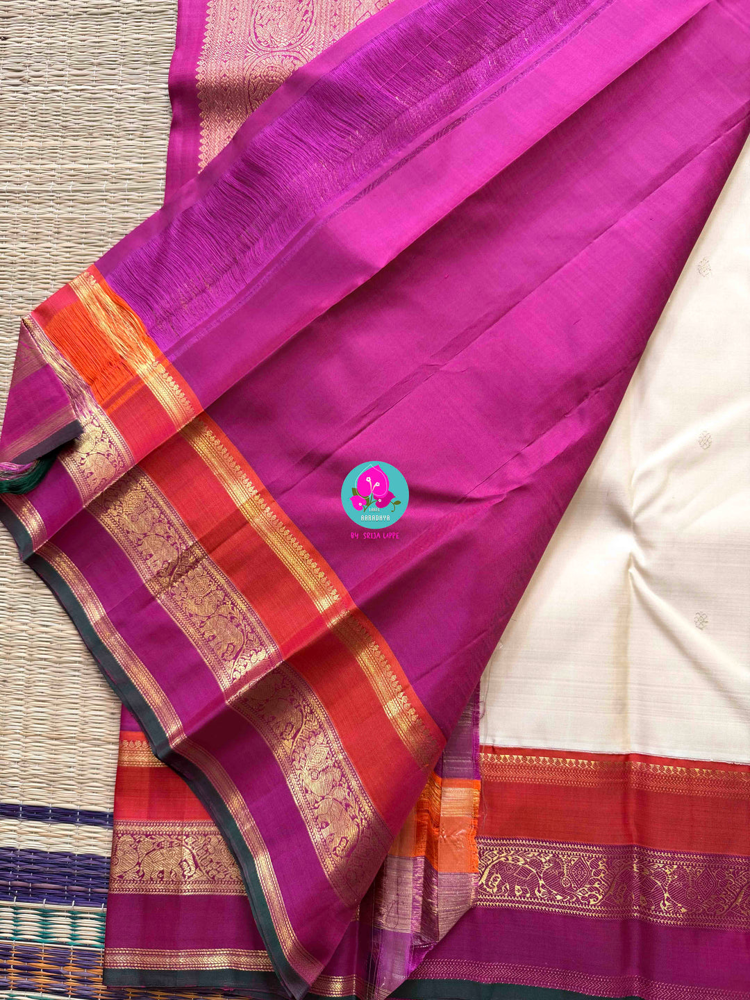 Serene Purity: Vintage Off-White Kanjivaram Saree with Rich Festive Contrast