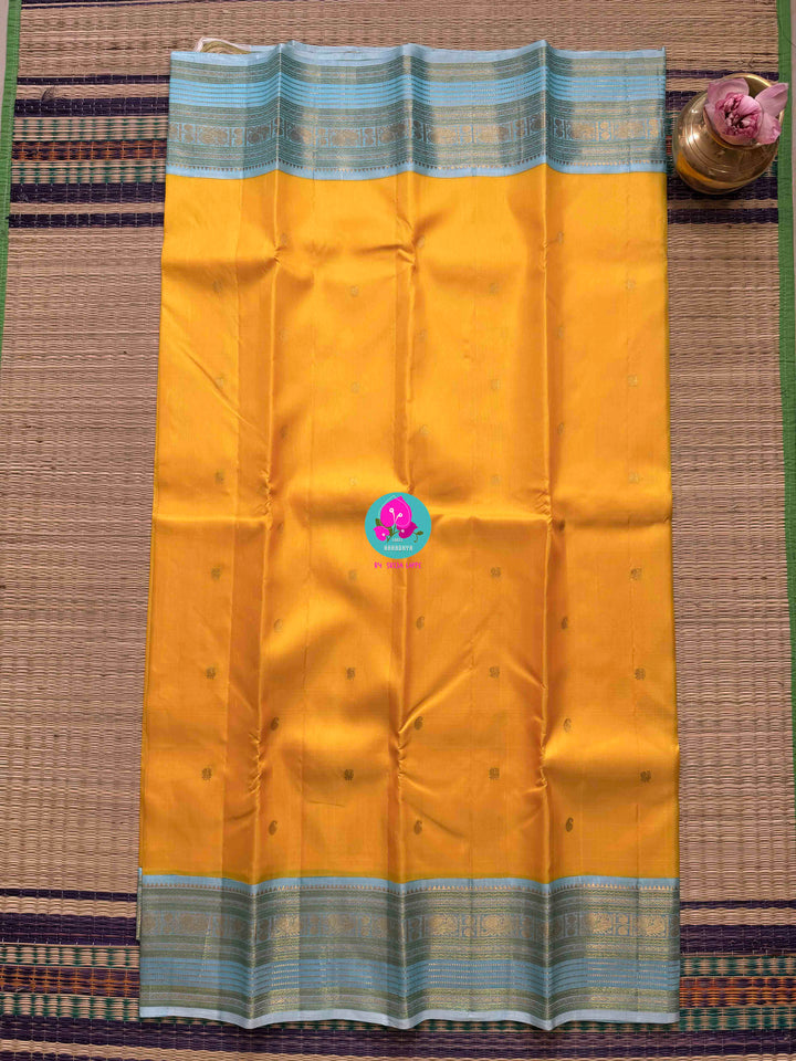 2G Zari Pure Kanchipuram saree with vintage mustard colour in light blue contrast