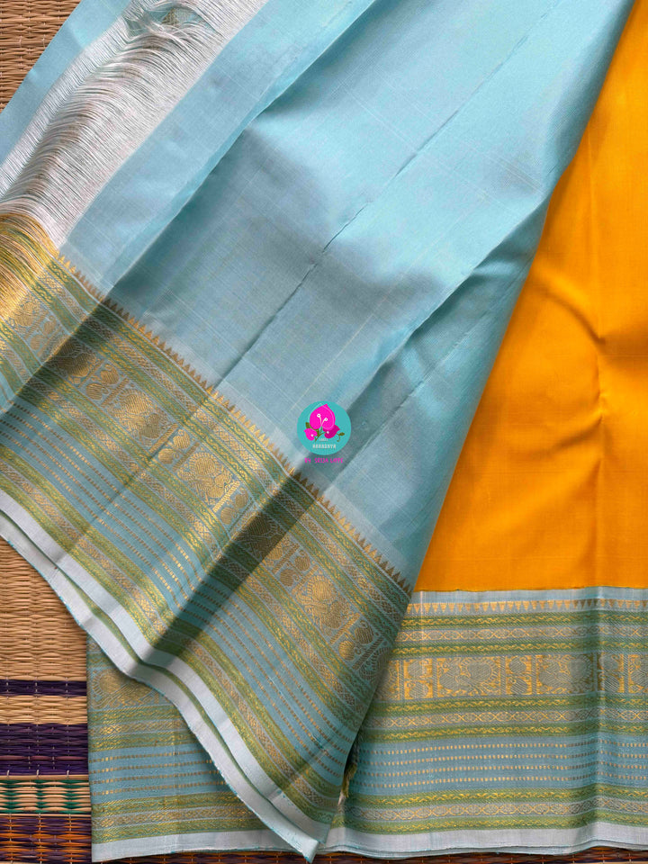 2G Zari Pure Kanchipuram saree with vintage mustard colour in light blue contrast