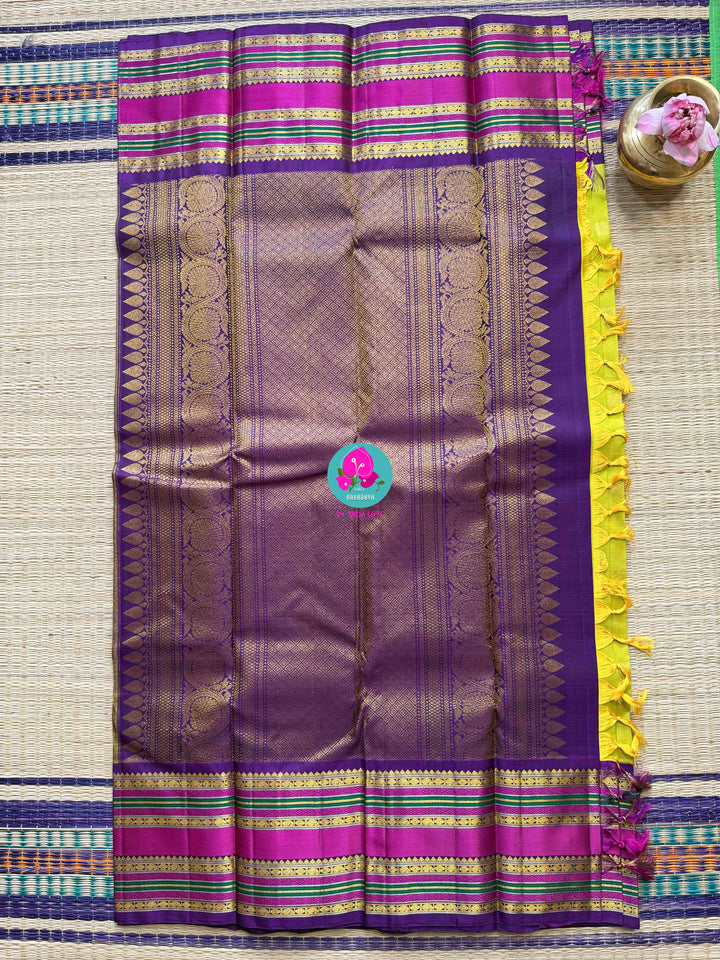 2G Zari Pure Kanchipuram saree with vintage Sampangi green paired with hand embroidered contrast blouse