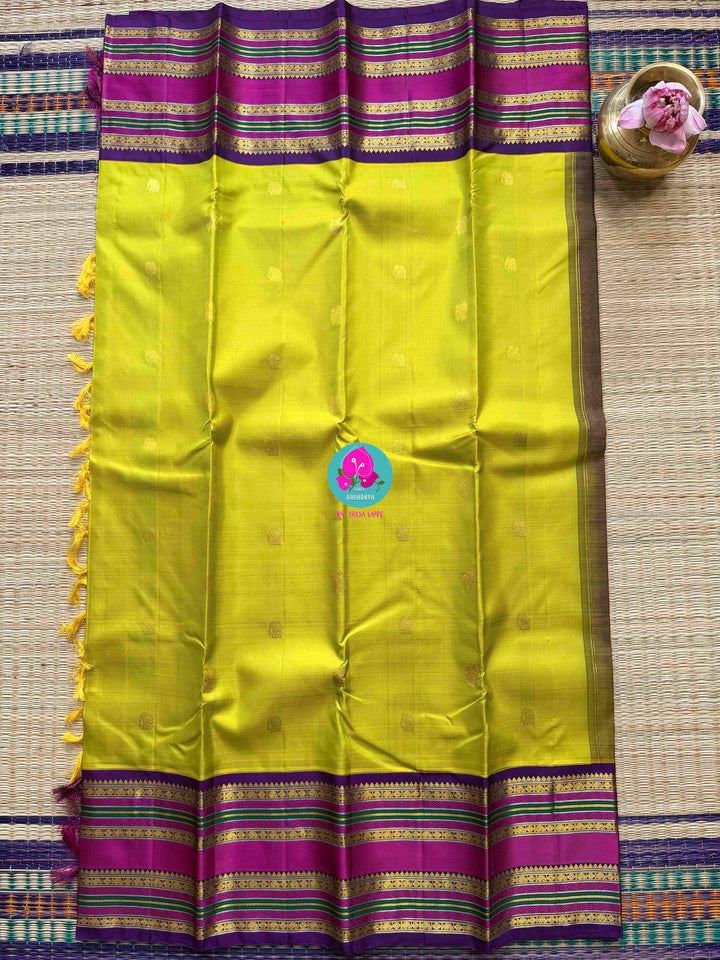 2G Zari Pure Kanchipuram saree with vintage Sampangi green paired with hand embroidered contrast blouse