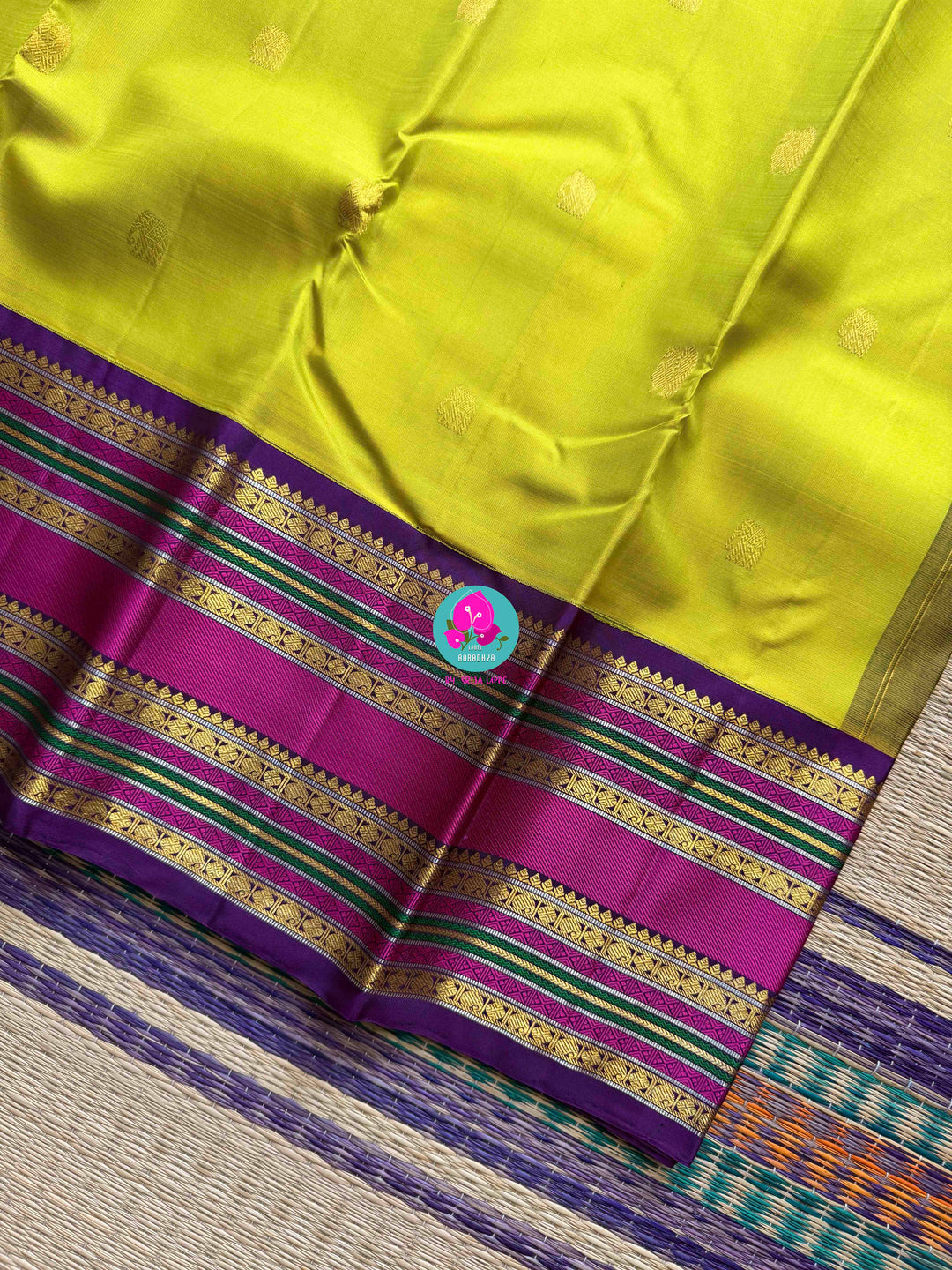 2G Zari Pure Kanchipuram saree with vintage Sampangi green paired with hand embroidered contrast blouse