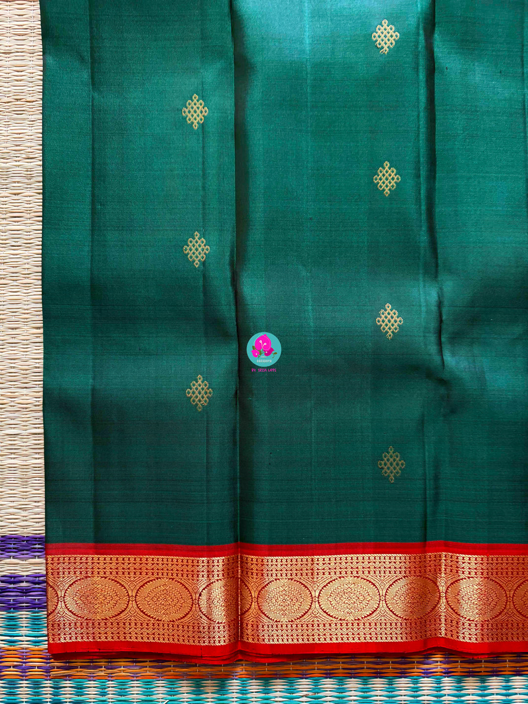 Auspicious Art: Bottle Green Kanchivaram silk Saree with Intricate Kolam Motif Weave