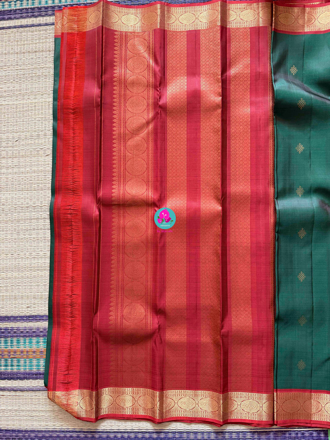 Auspicious Art: Bottle Green Kanchivaram silk Saree with Intricate Kolam Motif Weave