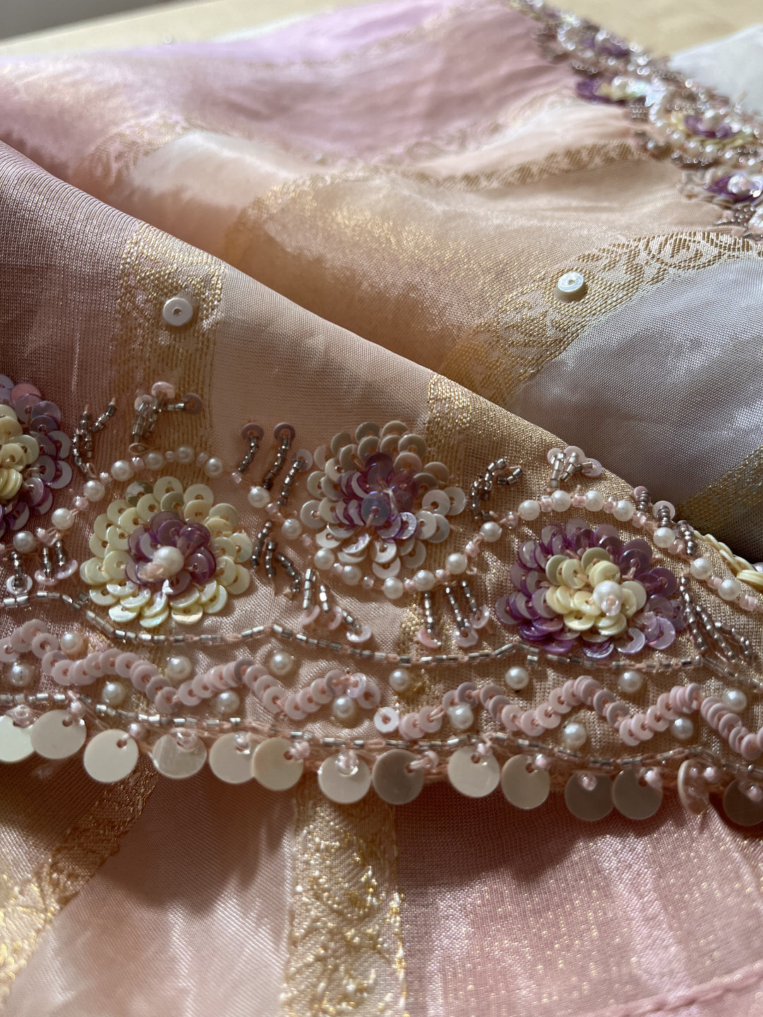 Multi-shaded tissue hand embroidered georgette saree