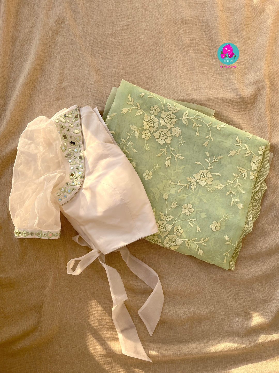 Thread Embroidered Organza Saree paired with maggam worked real mirror blouse
