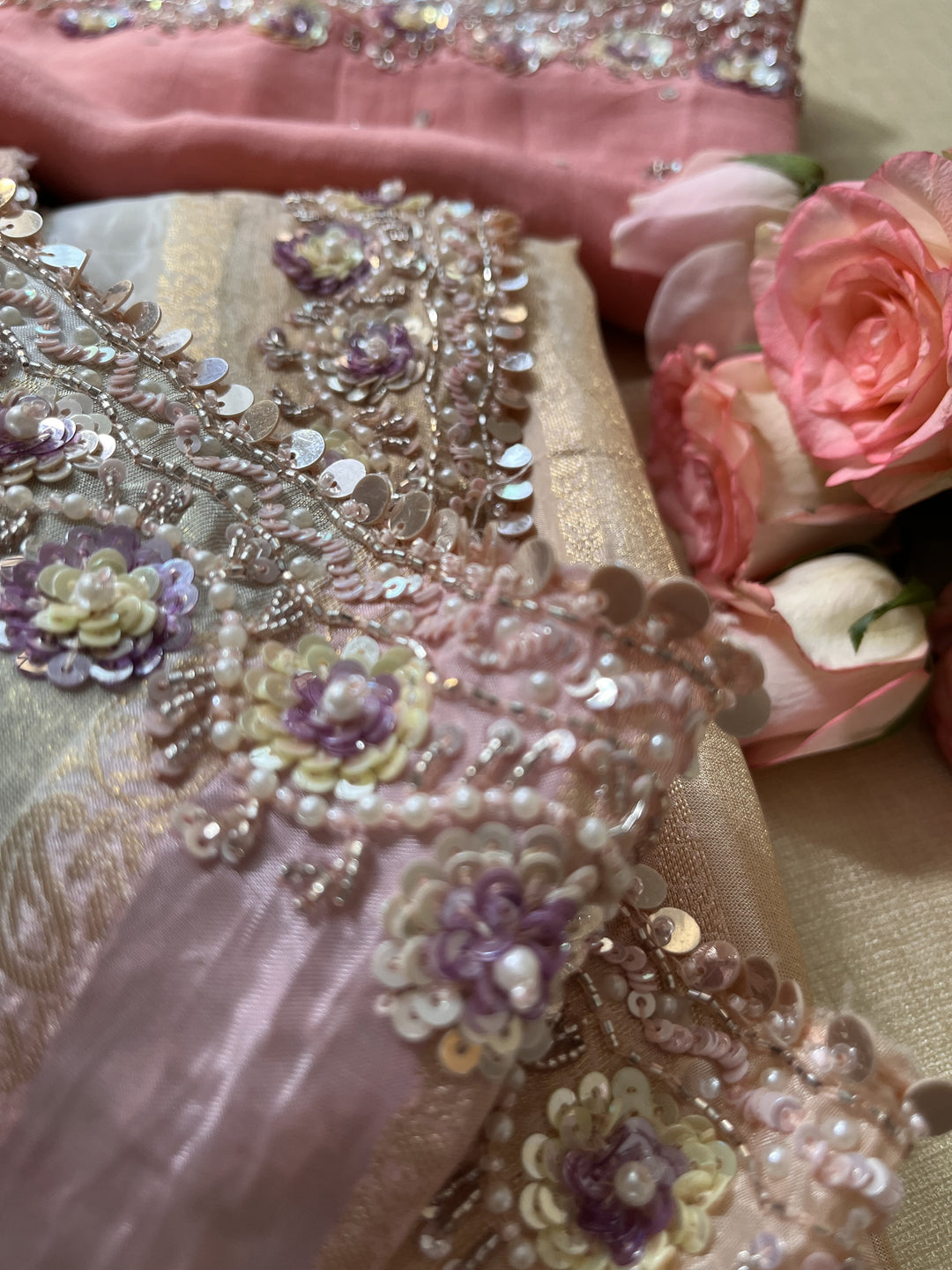 Multi-shaded tissue hand embroidered georgette saree