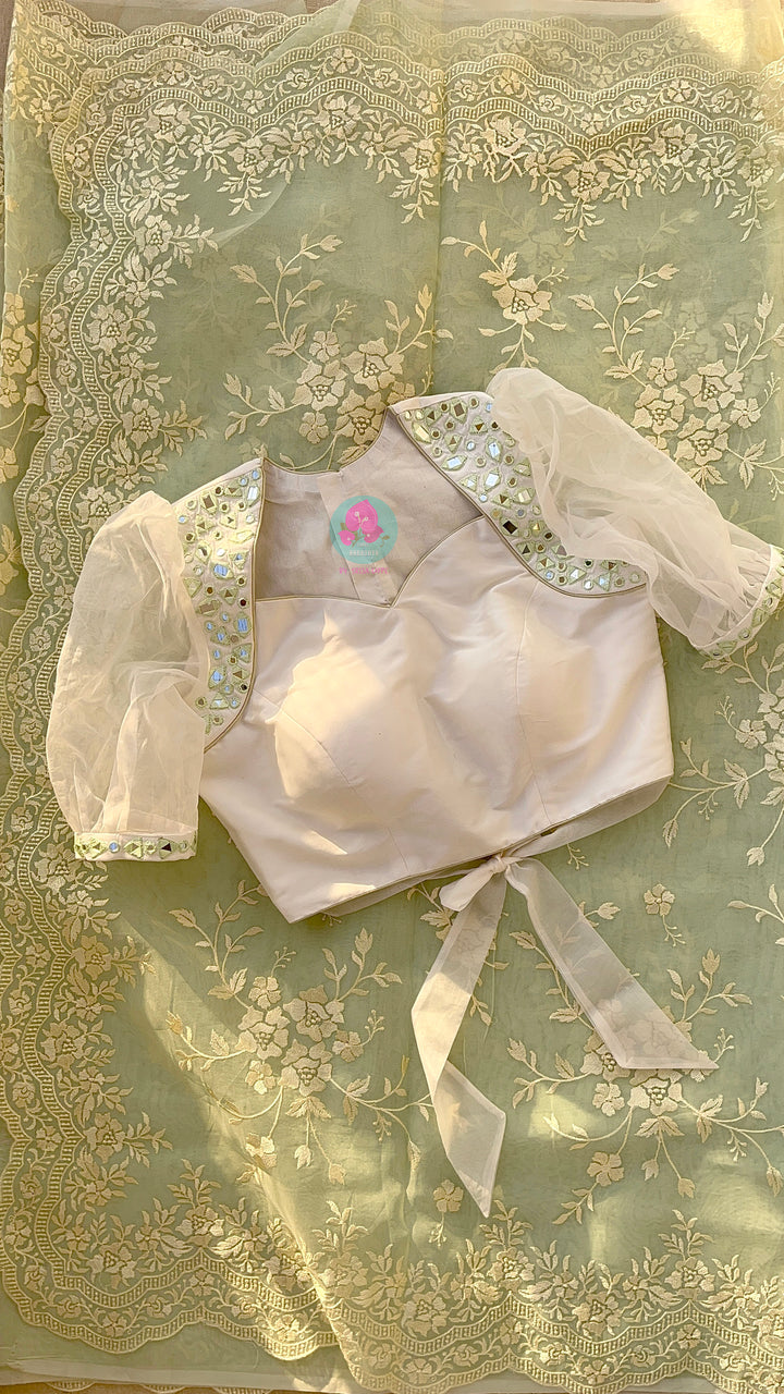 Thread Embroidered Organza Saree paired with maggam worked real mirror blouse