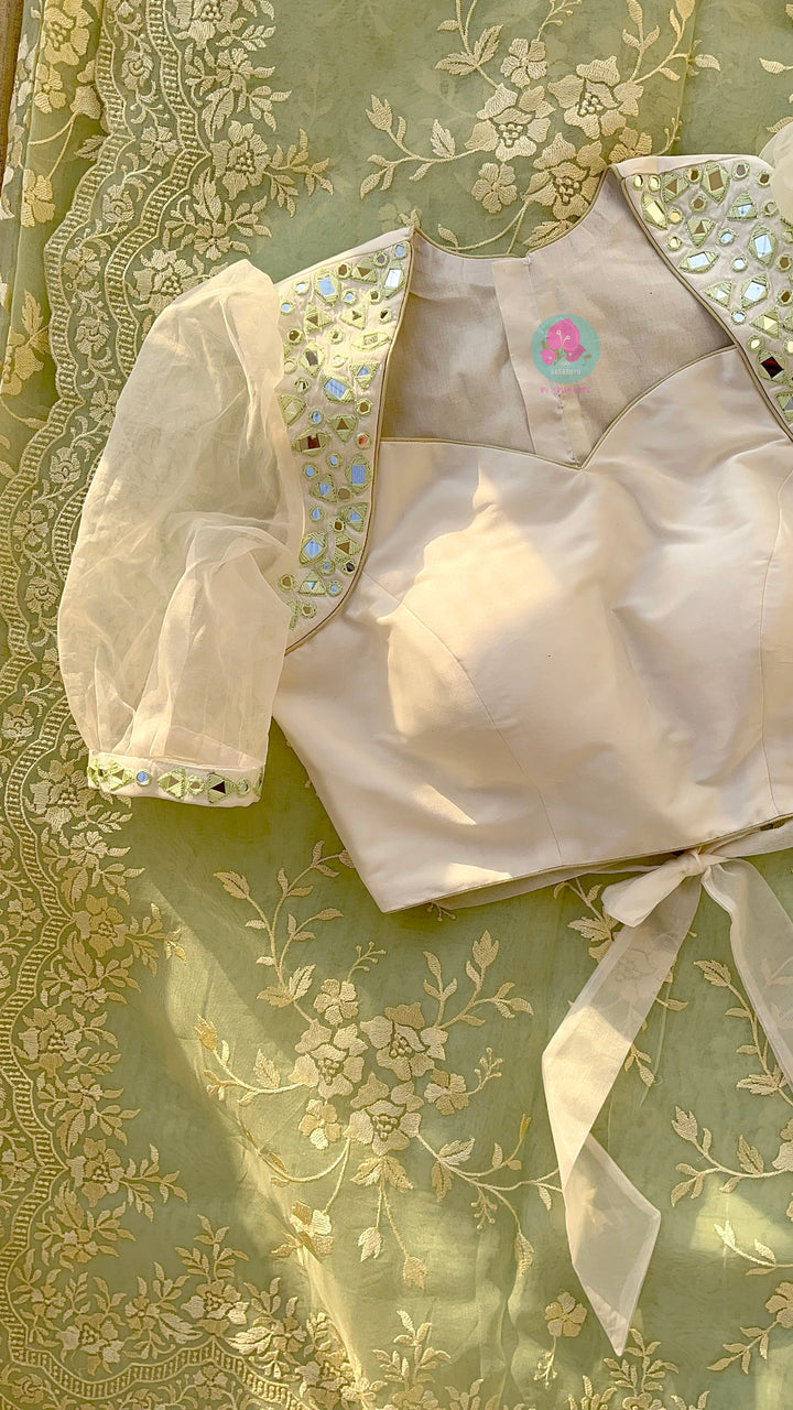 Thread Embroidered Organza Saree paired with maggam worked real mirror blouse
