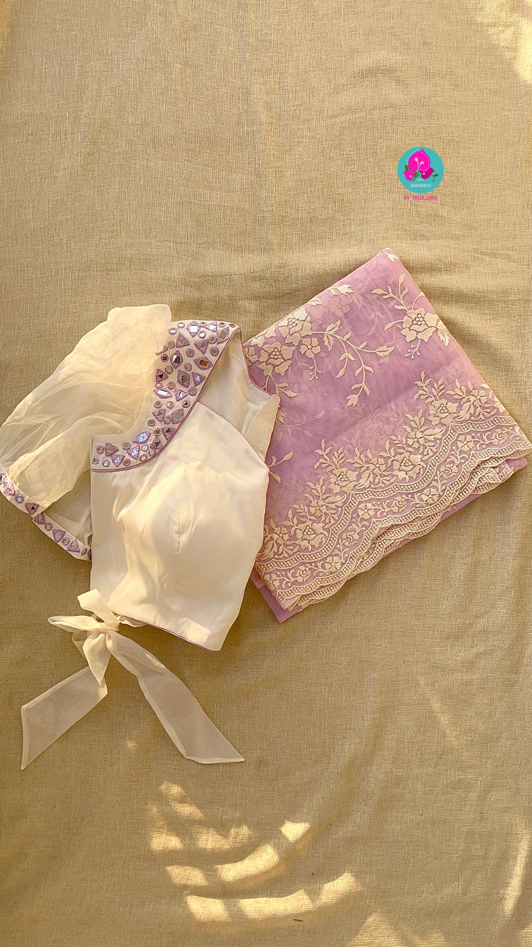 Thread Embroidered Organza Saree paired with maggam worked real mirror blouse