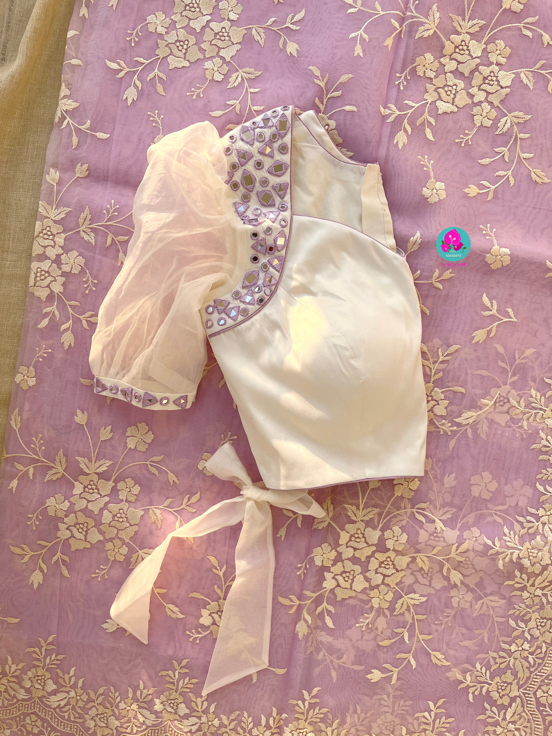 Thread Embroidered Organza Saree paired with maggam worked real mirror blouse