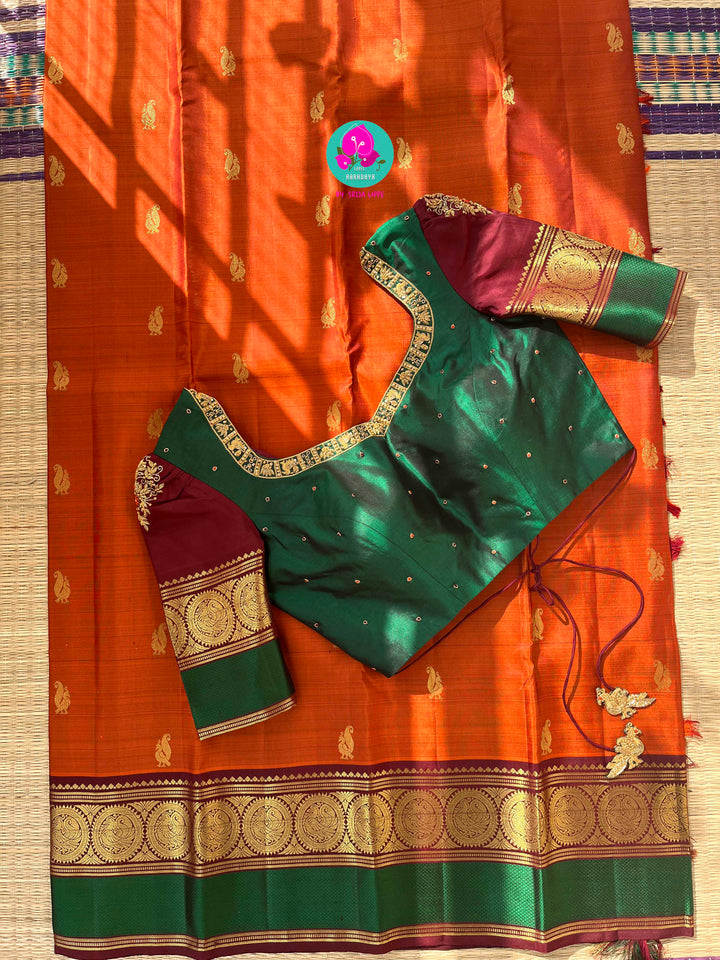 Kanchipattu handloom saree warm rust orange by a contrast border in sophisticated brown and a touch of vibrant green