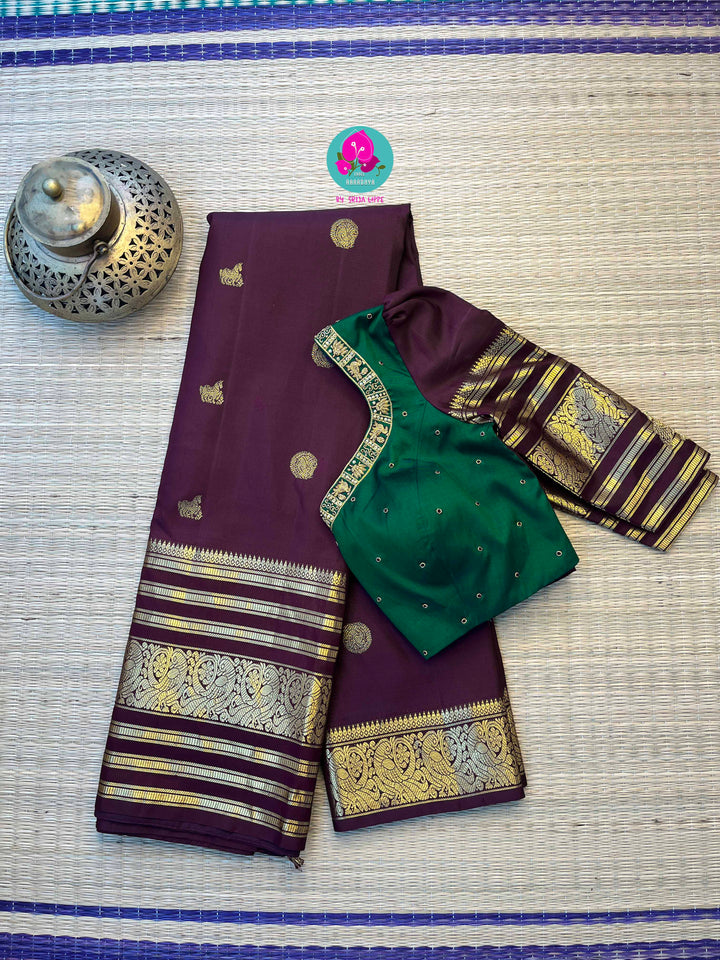 Kanchipuram 2g zari brown vintage saree in big border paired with hand embroidered blouse
