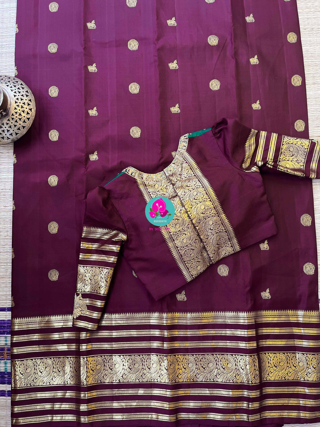 Kanchipuram 2g zari brown vintage saree in big border paired with hand embroidered blouse