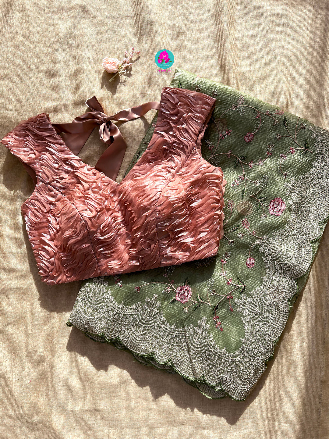 Crushed soft organza saree with Rose embroidery paired with Ribbon blouse