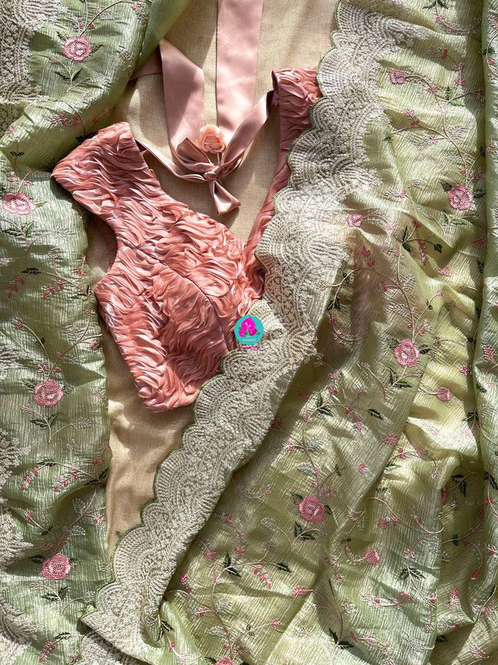 Crushed soft organza saree with Rose embroidery paired with Ribbon blouse