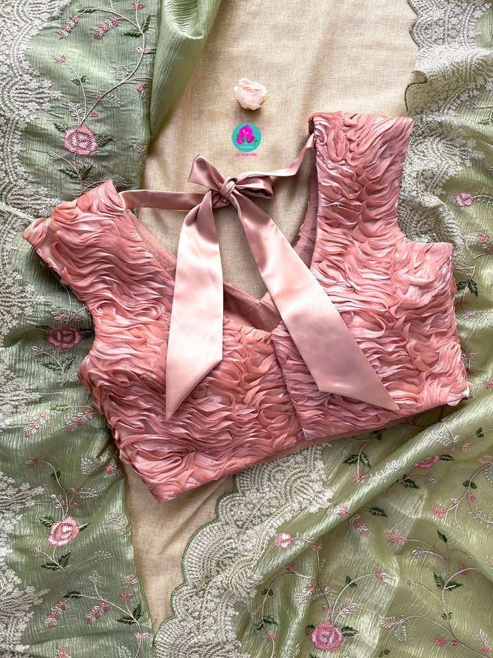 Crushed soft organza saree with Rose embroidery paired with Ribbon blouse